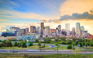 A scenic sunset view of the Denver skyline.