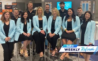 Photo of the Tour24 team at their event booth