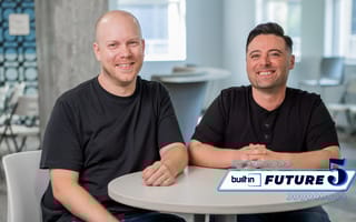 Elteve co-founders Ben Fuller (left) and Mike Weber (right) sit at a table inside.