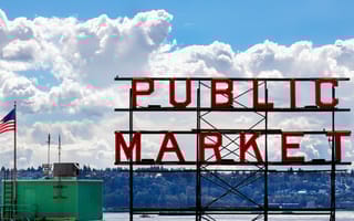 A U.S. flag flies beside Seattle's famous Pike Place Market.