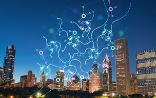 Image of Chicago at night with an overly of data points.