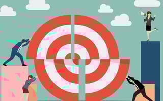 A leader encourages her team as they work together to align pieces of a target.