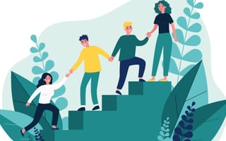 An illustration of employees uplifting each other.