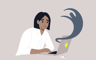 drawing of person working on laptop with ghost coming out