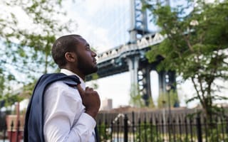 A man prepares to go into the office for his first day starting a new job.