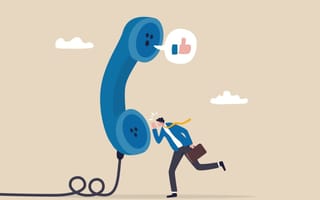 An illustration of a businessperson on a telephone.