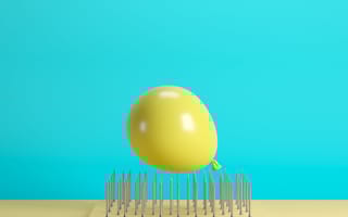 Rendering of a balloon balancing precariously on a bed of nails.