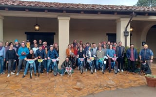 The SmarterX team gathers for a photo.