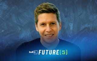 DreamTeam CEO and founder Brent Barkman in front of a blue textured background.