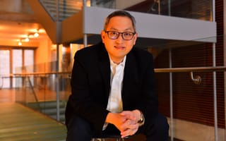 NanoGraf CEO Francis Wang sits in a chair for a photo.