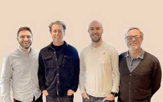 The Sendinblue and Captain Wallet executive team pose together for a photo.
