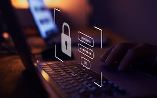 A user types a password into a computer.