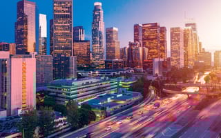 Downtown Los Angeles next to the expressway during sunset.