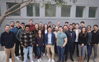 The Adept team stand together outside for a group photo.