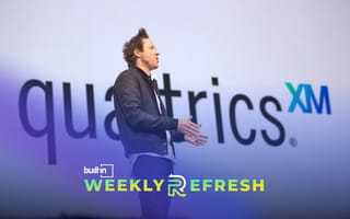 Qualtrics founder and executive chairman Ryan Smith speaking at an event.