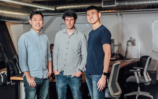 Upduo's founding team poses together for a photo in the office.