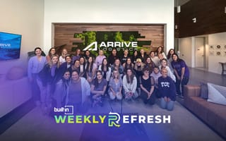 A group photo of the Arrive Logistics team inside the company's office.