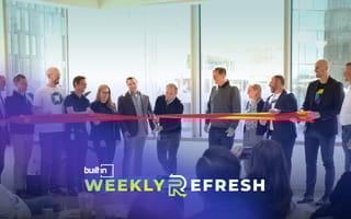 Officials celebrate cutting the ribbon at Dynatrace's new Denver office.