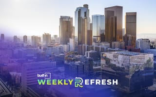 The LA skyline is pictured during daytime.