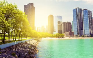 A city park with Chicago Beach in the background.