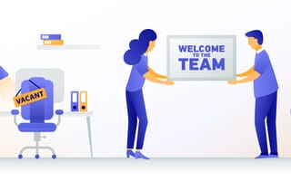 animated image of two people holding a "welcome to the team" sign in an office setting