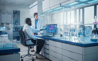 coworkers collaborating in a research lab