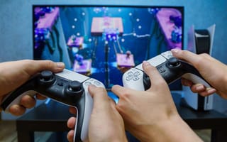 two people playing playstation