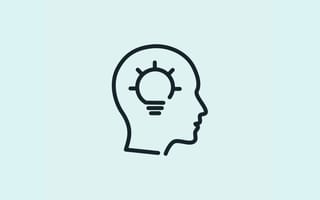 Graphic illustration of a person’s head, side profile, with a lightbulb turning on inside their brain.