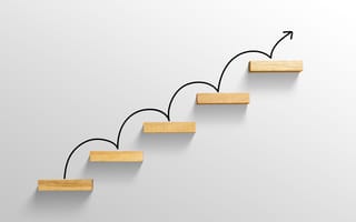 Illustration of rising arrow on staircase, showing incremental increases.