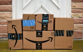 A stack of Amazon boxes is pictured.