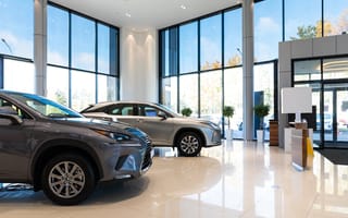 The interior of a car dealership is pictured.