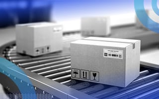 Packages on an assembly line representing model deployment