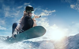A snowboarder in action is shown.