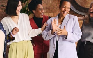 A group of women smiling.