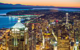 A photo of the Seattle skyline is shown.