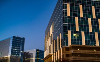 New High Tech North Austin District with rising Glass towers and office buildings at blue hours with lights illuminated and Night city lights Austin Texas USA