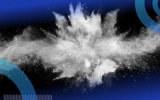 An explosion of powder over a black background.