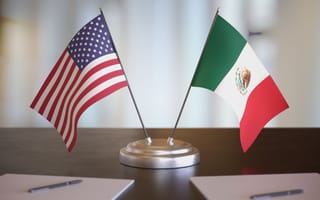 Photo of an American and Mexican flag.