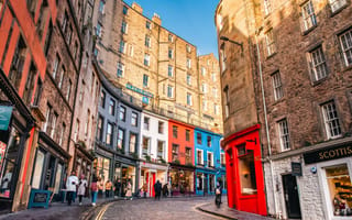 Colorful storefronts on Victoria Street in Edinburgh, Scotland.