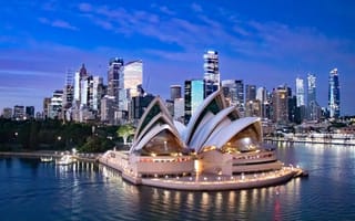 skyline of Sydney Harbor with the Sydney Opera House