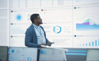 professional looking at graphs