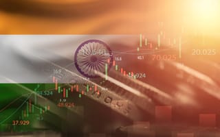 Data visualizations layered over an Indian flag.