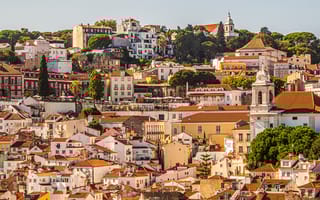 Lisbon rooftops on a hill.
