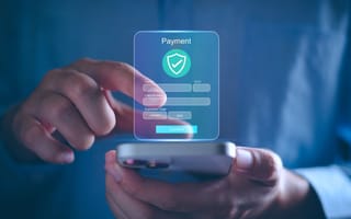 Person interacts with mobile fintech platform.