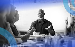 Executive leading a conversation at work