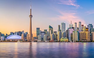 A view of the Toronto skyline along the water.