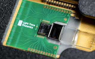 Close-up of Light Trace photonics chip.