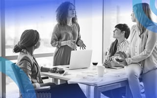 Team of employees discussing strategy in office