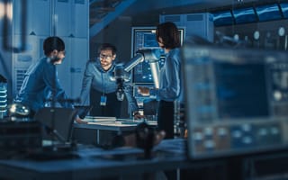 A team of robotics engineers is shown.