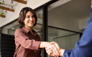 two people shaking hands